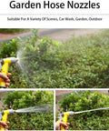 Heavy Duty Wall Mounted Garden Hose Reel With Smooth As Butter Crank Handle Industrial Stainless Steel Water Hose Holder in use watering plants.