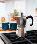 Stovetop Espresso Maker For Home Brewing And Camping Italian Moka Pot In Classic Aluminum 6 Cup Mocha Pot on kitchen stove