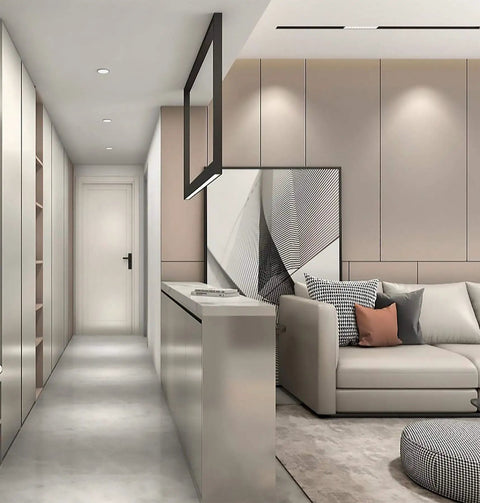 Modern minimalist living room with neutral tones, featuring a beige sofa, geometric artwork, hallway, and built-in storage.