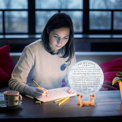Woman writing beside Engraved 3D Moon Lamp With RGB Lights To My Wife Dope Gift From Husband 5.9 Inch Moon Light For Wife Birthday
