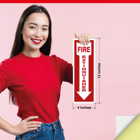 Woman holding 4x12 inch red fire extinguisher sticker, 5 mil vinyl, weatherproof self adhesive sign with arrow for safety.