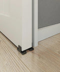 Two Sets 15 To 16 Inch High Black Floor Rail Hardware Door Track POM Guide Components For Sliding Barn Gate Stopper installed view