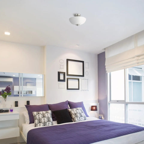 Modern bedroom with 13 Inch Two Light Semi Flush Mount Ceiling Light In Brushed Nickel With Chrome Accents And Frosted Glass Shade