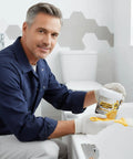 No Sweat Waterproof Adhesive And Invisible Anti Leakage Coating Featuring Built In Brush For Roofs Walls And Floors Dries Clear, man applying sealant with a brush.