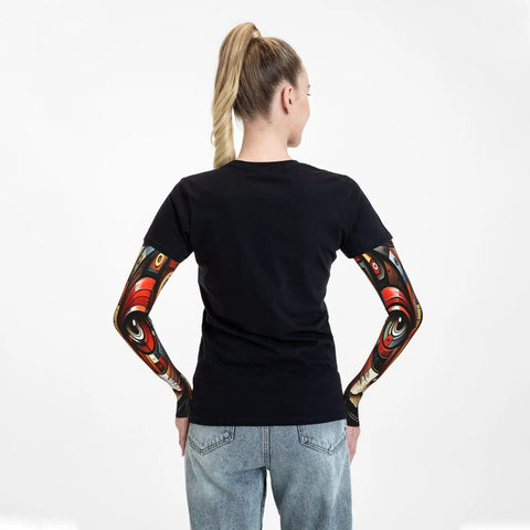 Snag These Fly Ice Silk Arm Sleeves With Cute Cat Graphics And Grippy Thumb Holes Offering Ultra Cool UV Shielding For Hot Days Of Running Cycling Or Driving shown on a woman from behind.