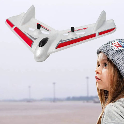 2.4GHz Ready To Fly RC Plane For Beginners With 3-Axis Gyro Auto Stabilization flying over a child outdoor