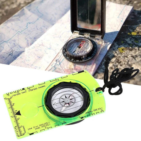 Trail-Ready All-In-One Orienteering Compass For Hiking, Camping, Backpacking And Outdoor Adventure Gear on a map outdoors