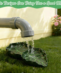 Dual Leaf Decorative Splash Block And Gutter Downspout Rain Diverter Extension For Lawn Patio Yard Garden Heavy Duty Weatherproof No Hassle Backyard Kickback To Shield Foundation Smooth Water Flow with water flowing from downspout.