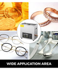 Top Notch Ultrasonic Cleaner Featuring 40 Khz Dual Transducers For Quick Grime Busting And Gentle Polish On Jewelry Watches Tools And Kitchen Gadgets Portable Mini Wash Tank with jewelry, eyeglasses, and utensils.