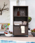 Outdoor Pool Towel Storage Cabinet Organizer With Cover Wicker Towel Valet Rack On Wheels Shelves And Drawer Poolside Caddy For Hot Tub Spa Brown Great For Outdoor Relaxation And Easy Towel Management placed by poolside with towels and drinks.