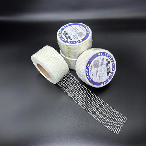 Three rolls of Fiberglass Drywall Repair Tape Self Adhesive Mesh, 2 Inch by 100 Ft Roll, showing mesh detail.