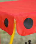 Ladybug pattern on red canopy of Kids Patio Swing Bench With Adjustable Canopy And Safety Belt 2-Seater Outdoor Swing Chair