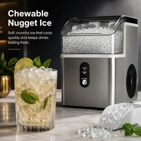 Beast Mode Countertop Nugget Ice Maker churns out soft chewable nugget ice with a drink featuring mint and lime.