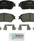 BOSCH QuietCast ceramic front brake pad set with backing plates and mounting hardware.