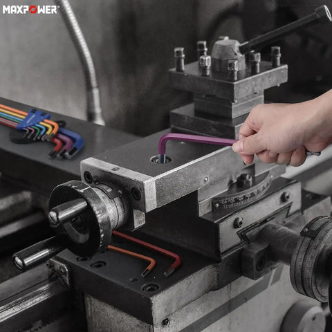 Using Pro Grade 18-Piece Hex Key Set With Extra Long Ball End Wrenches And T Handle on machinery, showing purple wrench in use.