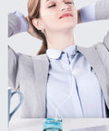 Person using Hydrogen Water Bottle With Sprayer For Direct Inhalation Portable 400ml Hydrogen Rich Cup for relaxation.