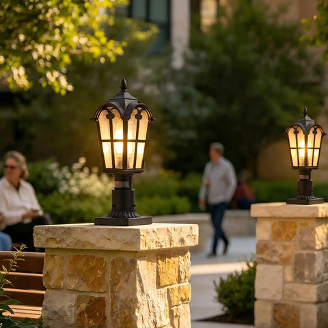 Two Pack 17 Inch Outdoor Post Light Fixtures with Motion Sensor and Dusk to Dawn on stone pillars, black lanterns glowing