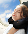 Woman resting on airplane with Gothic Happy Halloween Travel Pillow U Shape Neck Support For Air Travel Car Ride Office Or Home Napping Portable Headrest Ergonomic Memory Foam Fill Super Comfy And Compact Comfort For Long Trips.