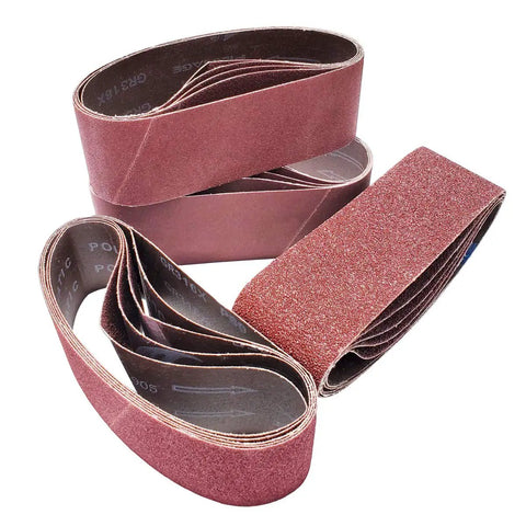 Close-up of 20 Piece 3x21 Inch Aluminum Oxide Sanding Belts Set With 5 Belts Each In 40 80 120 240 Grits, Open Coat Pro Grade Anti Static