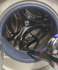 3-In-1 Vacuum Attachment Bundle With 23 Inch Flexible Crevice Tool used on a dryer vent opening