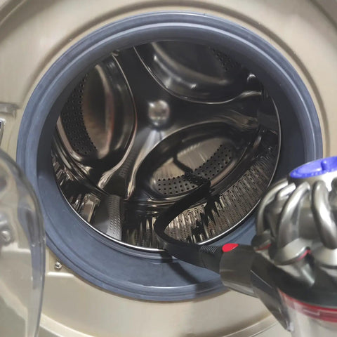 3-In-1 Vacuum Attachment Bundle With 23 Inch Flexible Crevice Tool used on a dryer vent opening