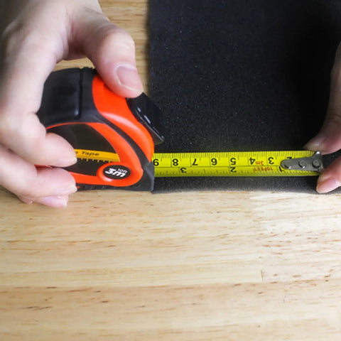 Person measuring with tape from 239-Piece All In One Home Tool Set With Carrying Case For DIY Repairs Grab-And-Go Garage Office