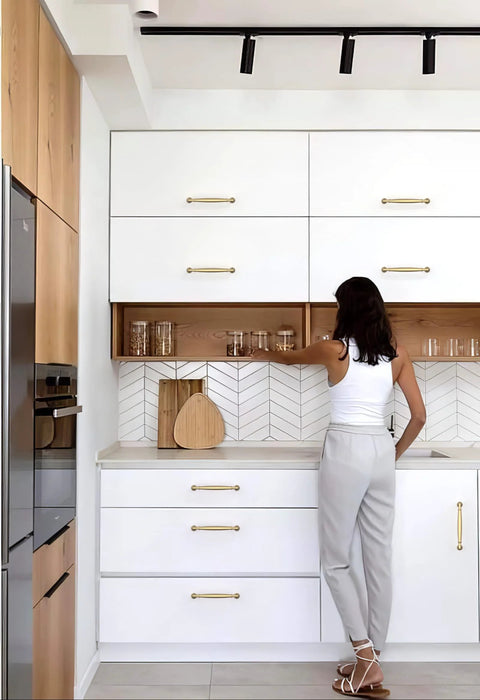 Modern kitchen with Champagne Bronze Cabinet Pulls 5 Inch 128mm 10 Pack for Kitchen Cabinets and Drawers, installed on white cabinetry.