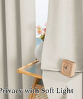 Close-up view of Soft Faux Linen Curtains 63 Inch Long, Two Panels, Cozy Light Filtering Grommet Window Treatments, Heather Ivory.