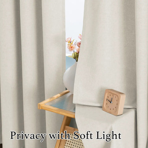 Close-up view of Soft Faux Linen Curtains 63 Inch Long, Two Panels, Cozy Light Filtering Grommet Window Treatments, Heather Ivory.