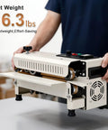 Top Shelf Portable Bag Sealer Machine For Food And Tea Packing With No Sweat Temperature Controls And Slick Desktop Setup For Quick Kitchen Refreshes, lightweight design, 16.3 lbs, user holding machine.