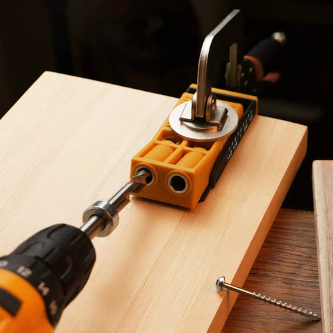 Drill guide in use from Two Pocket Hole Jig Kit For Woodworking DIY Friendly Drill Guide Set with jig on wooden board