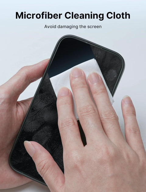 Microfiber cleaning cloth, white, for smartphone screens; close-up of hand wiping a phone.