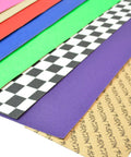 Multi-colored grip tape sheets for skateboards, including Ultra Sticky 9 By 33 Grip Tape For Longboards, Cruisers And Scooters.