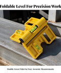 Foldable level with Steel-Gripping, Yellow on a metal surface for precise horizontal and vertical alignment measurements.