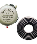 Driveway Signal Bell Kit With 50 Foot Hose And End Of Hose Plug For Quick Yard Alerts Outdoor Doorbell System, shown in packaging