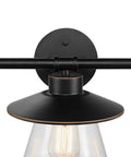 Close-up of Nate 5-Piece All-In-One Bathroom Set's 3-light vanity in oil rubbed bronze with clear glass shades for a warm modern farmhouse vibe.