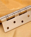 Two Pack 4 Inch Ball Bearing Flush Hinges Stainless Steel For Cabinets And Doors With Screws displayed on fabric
