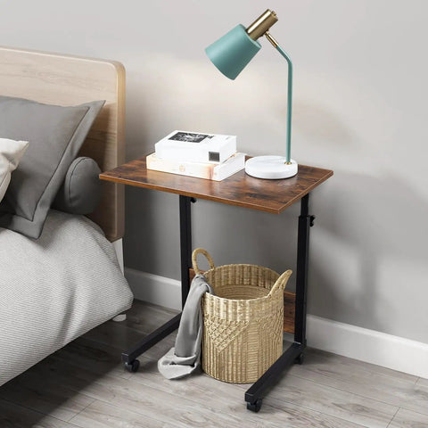 Rock Solid Height Adjustable Computer Desk With Smooth Rollin Casters For Easy Repositioning And Firm Lockdown Heavy Duty Steel Top used as a bedside table.