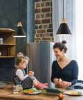 Dope Black Pendant Light Two Pack 9.4 Inch Farmhouse Modern Pendant Lighting in kitchen over table with woman and child