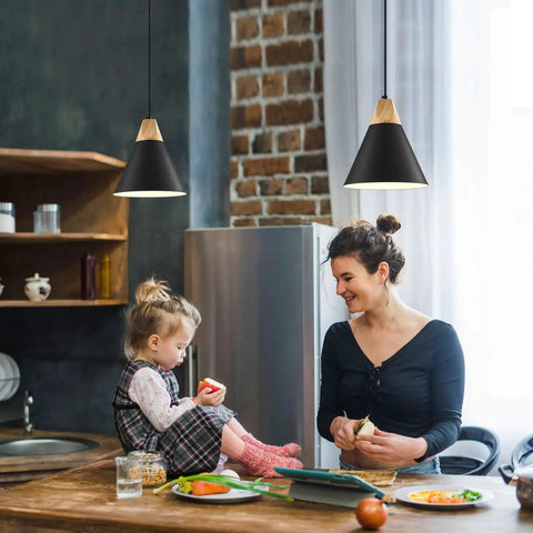 Dope Black Pendant Light Two Pack 9.4 Inch Farmhouse Modern Pendant Lighting in kitchen over table with woman and child