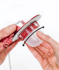 Hands adjusting K-400H-040-T5 PerforMAX Fill Valve And 3-Inch Flapper Toilet Repair Kit, showing 3-inch flapper component.