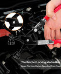 Close-up of the Beefy 9 Piece Hose Clamp Pliers Set With Long Reach Cabled Pliers in use on a car engine.