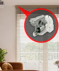 Heavy Duty Low Profile Metal Cord Tilter For 2 Inch Blinds, showing white resin and steel connector in living room setting.