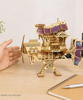 Fun 3D Wooden Airship Puzzle Kit for Teens and Adults displayed on desk with visible propeller and detailed cabin