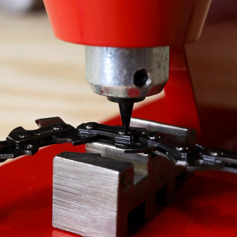 Heavy Duty Chainsaw Chain Breaker And Rivet Tool Kit for Quick Link Removal and Rivet Punching on a Stable Workbench in use