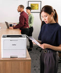 Office Printing Powerhouse Fast 50 Pages Per Minute Monochrome Laser Printer With Wireless Networking And Duplex Auto-Printing on desk