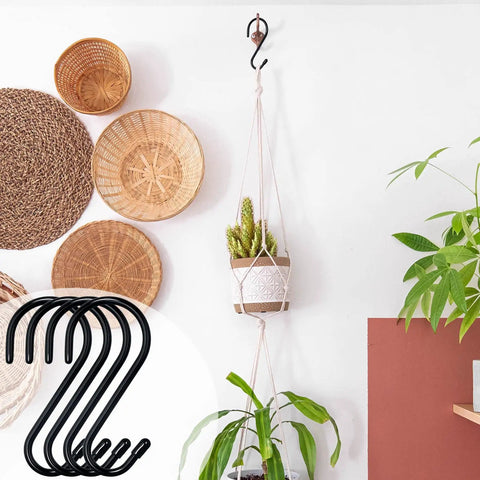 12 Pack Four And A Half Inch Vinyl Coated S Hooks used for hanging plant pots, shown in use in a decorative indoor setting.