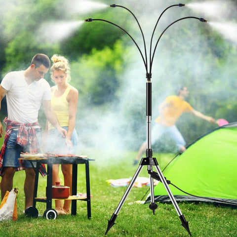 Standing misters for outdoor cooling on the go with four spray heads near a BBQ and camping tent