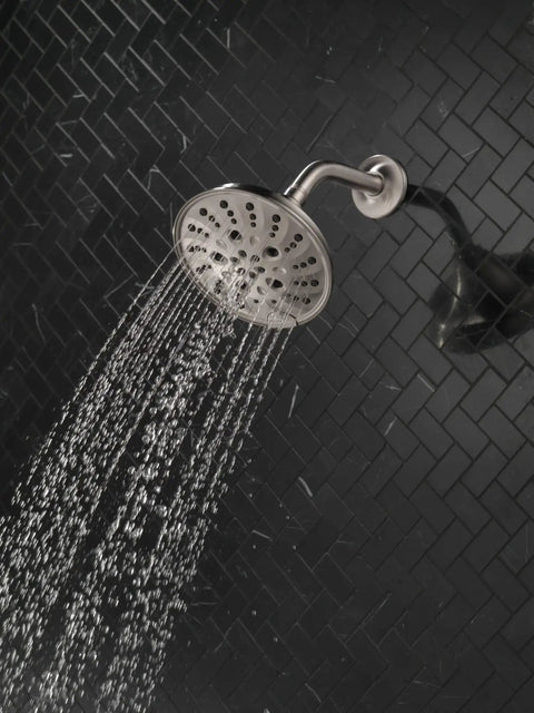 Universal Showering Components Showerhead With Lumicoat Stainless Finish For Easy Wipe Clean And Mineral Buildup Resistant H2Okinetic Technology Delivers More Water And Powerful Coverage With PowerDrench Spray