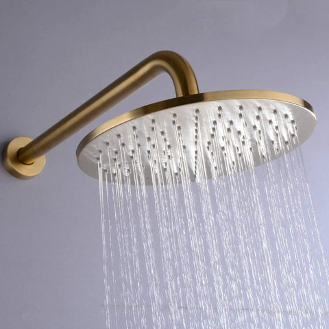 High End Bathroom Flex With This 12 Inch Round Shower System Built From Rock Solid Brass And Sporting Sleek Brushed Gold Wall Mounted Rainfall Mixer Valve Combo Kit With Straight Silicone Nozzle For Ultimate Spa Luxury - Closeup of brushed gold shower head with flowing water.